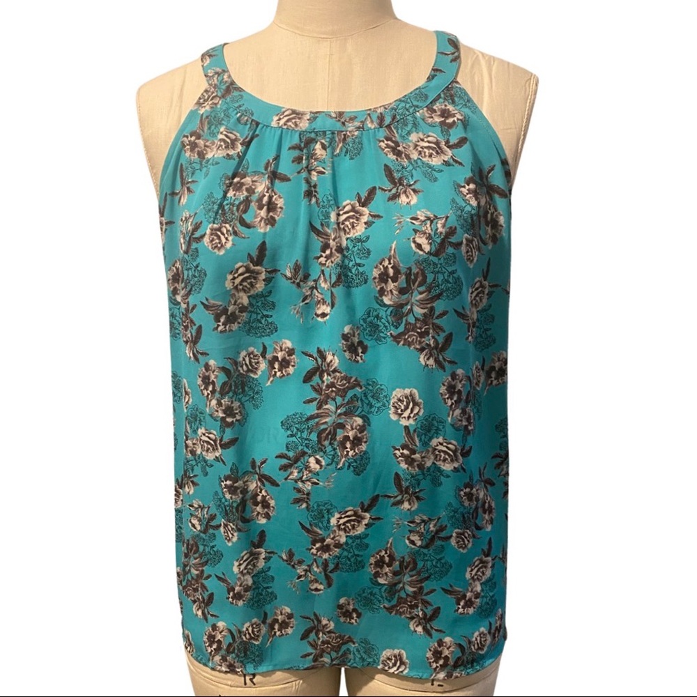 Torrid High-Lo Top with Black & White Floral Pattern on Teal Background